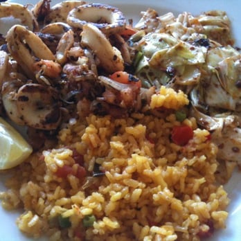 Picaro - Calamari with sides of rice and garlic with garlic and onions. Yummers and a deal! - Spanish Near Me - San Francisco, California