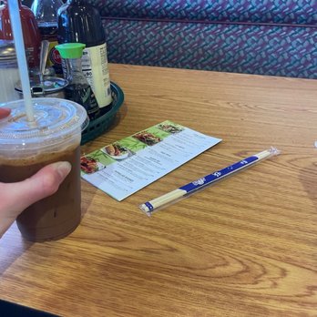 Pho 400 - Vietnamese iced coffee, table, menu, chopsticks, and the condiments. - Vietnamese Near Me - New Brighton, Minnesota Pho 400 - Vietnamese iced coffee, table, menu, chopsticks, and the condiments. - Vietnamese Near Me - New Brighton, Minnesota