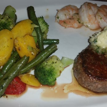 Louies Hanover Square - perfectly cooked steak, with garlic butter. - Italian Near Me - Horseheads, New York Louies Hanover Square - perfectly cooked steak, with garlic butter. - Italian Near Me - Horseheads, New York