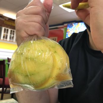 Puerto Viejo Restaurant - Mango en bolsa  Fresh sliced mango with lime, salsa lizano, and salt - Latin American Near Me - Bound Brook, New Jersey