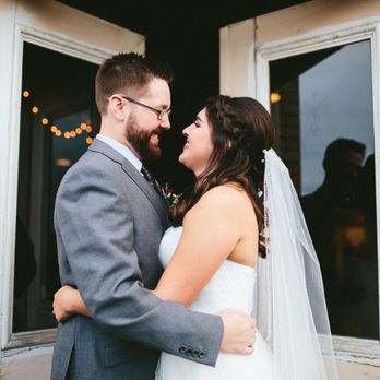 Riverside Place - a bride and groom standing in front of a door - Venues & Event Spaces Near Me - Spokane, Washington Riverside Place - a bride and groom standing in front of a door - Venues & Event Spaces Near Me - Spokane, Washington