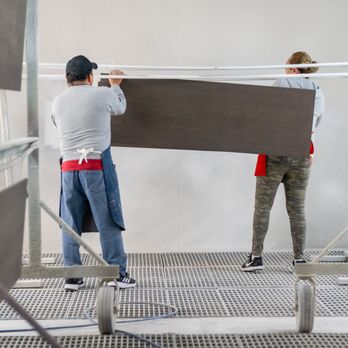 Chip's Kitchens & Baths - two men working on a piece of wood - Countertop Installation Near Me - Arlington, Texas Chip's Kitchens & Baths - two men working on a piece of wood - Countertop Installation Near Me - Arlington, Texas