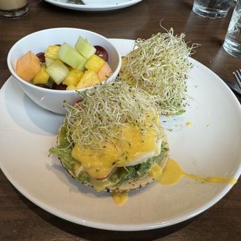 Honey Seed - Smashed Avocado Tomato Benedict with fruit - Bagels Near Me - Chattanooga, Tennessee