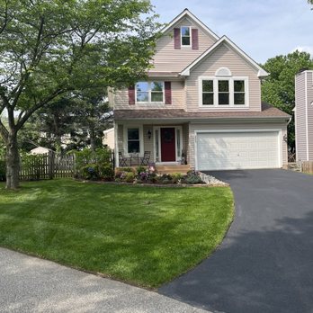 RAM Properties - the front of a house with a driveway leading to the front of the house - Landscaping Near Me RAM Properties - the front of a house with a driveway leading to the front of the house - Landscaping Near Me