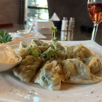 Cracovia Polish Restaurant - Dozen steamed spinach pierogi with onions and butter - Polish Near Me - Spring Hill, Florida