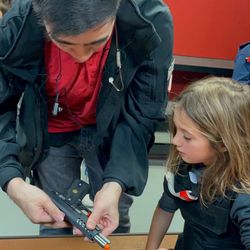Tac City Tech helping out a youngster.