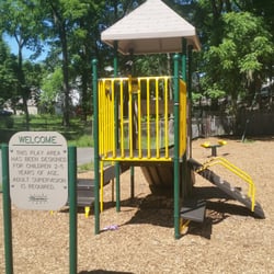 Harrison Street Playground - 2-5 Year Old Play Area with see-saw next to GATED paved area on the left