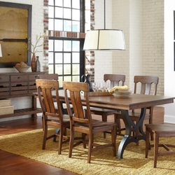 Creative Dinettes & Bar Stools Furniture Store - This industrial chic dining set is really turning heads in our showroom. Stop in and see it for yourself!