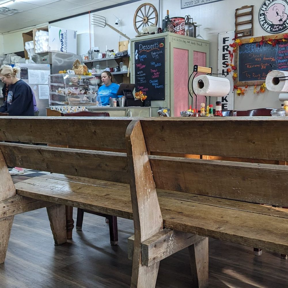 Sunday Diner - a wooden bench in a restaurant - Southern Near Me - Clayton, Georgia Sunday Diner - a wooden bench in a restaurant - Southern Near Me - Clayton, Georgia