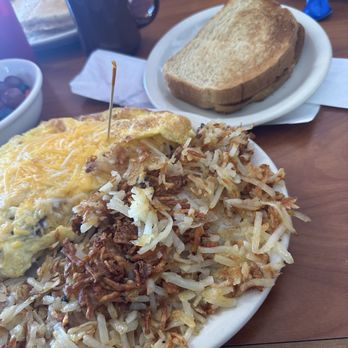 Ogie's Cafe - 3 egg omelette with bacon cheese and onion, asked for the hash browns extra crispy! - Cafes Near Me - West Valley City, Utah Ogie's Cafe - 3 egg omelette with bacon cheese and onion, asked for the hash browns extra crispy! - Cafes Near Me - West Valley City, Utah