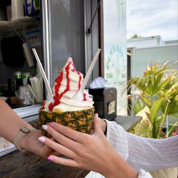 The Pineapple Hut - Pineapple and strawberry swirl topped w/ strawberry sauce - Ice Cream & Frozen Yogurt Near Me - Folly Beach, South Carolina The Pineapple Hut - Pineapple and strawberry swirl topped w/ strawberry sauce - Ice Cream & Frozen Yogurt Near Me - Folly Beach, South Carolina