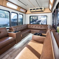 The Little Green Bus Company - Come ride in Irene, our luxury brown leather 14-seater party bus!