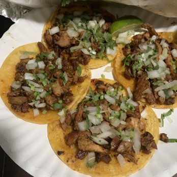 El Kechu - four tacos on a paper plate - Tacos Near Me - Houston, Texas