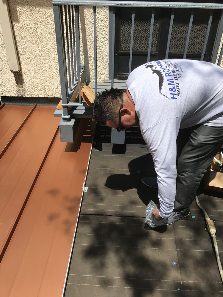 Slide of H&M ROOFING