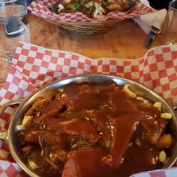 Above is the poutine La Chix (chicken breast poutine) and below is the smoked meat poutine. Above is the poutine La Chix (chicken breast poutine) and below is the smoked meat poutine.
