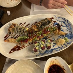 Umi Japanese Cuisine - Starting from bottom: New York Roll, Amazing Roll, top left is Spider Roll and top right is Creamy Crab Roll