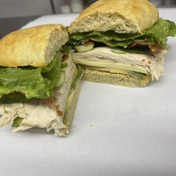 Hot Contents - The Garden Style Club. Turkey, Cabot white cheddar, bacon, cucumbers, tomato, lettuce, and choice of one of our many aioli. - Sandwiches Near Me - Mexico, Maine
