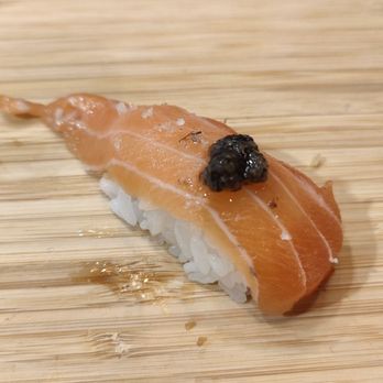 Tekkaba - a piece of sushi on a bamboo cutting board - Sushi Bars Near Me - Vancouver, British Columbia