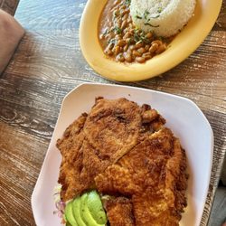 El Cuencanito - Breaded chicken! (There are fries and salad under the chicken
