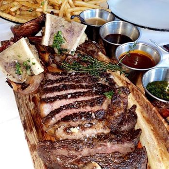 Avalon Beach House - The tomahawk steak cooked to perfection the presentation was on point! - Cocktail Bars Near Me - Delray Beach, Florida Avalon Beach House - The tomahawk steak cooked to perfection the presentation was on point! - Cocktail Bars Near Me - Delray Beach, Florida