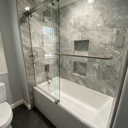 Endless Kitchen & Bath - Tub remodel with barn style double sliding door
