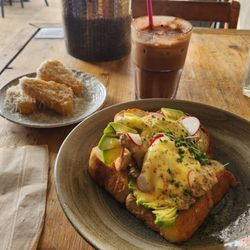 Lucky Beach - Loaded hash browns, Crab Bennie and iced turbo.