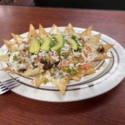 Mi Chalateca Pupuseria - Nachos with marinaded pork. Yum!