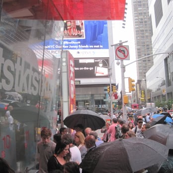 TKTS Times Square - Line on a rainy day. Go to end. - Ticket Sales Near Me - New York, New York