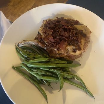 Range - Bacon and roasted garlic crusted pork chop - Steakhouses Near Me - San Antonio, Texas