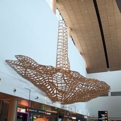 North Satellite Terminal - Wooden sculpture