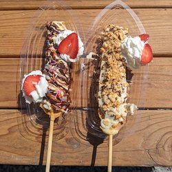Milk chocolate + sprinkles + whip cream + strawberry & White chocolate + almonds + whip cream + strawberry