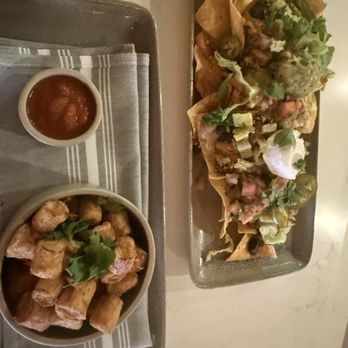 Mood - Bomb nachos and their hearts of palm "calamari" w/spicy marinara. Yum! - Vegan Near Me - Tequesta, Florida