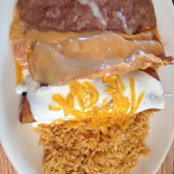El Chico - Enchilada wendsday                    Spinach an sour cream and a cheese with queso , it was good - Mexican Near Me - Rockwall, Texas