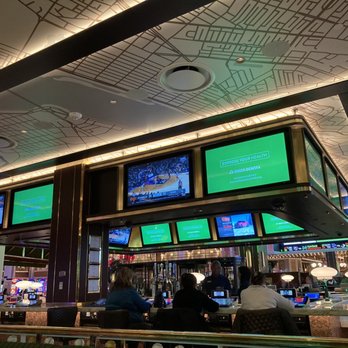 The Sportsbook - a view of the bar - Sports Bars Near Me - Everett, Massachusetts The Sportsbook - a view of the bar - Sports Bars Near Me - Everett, Massachusetts