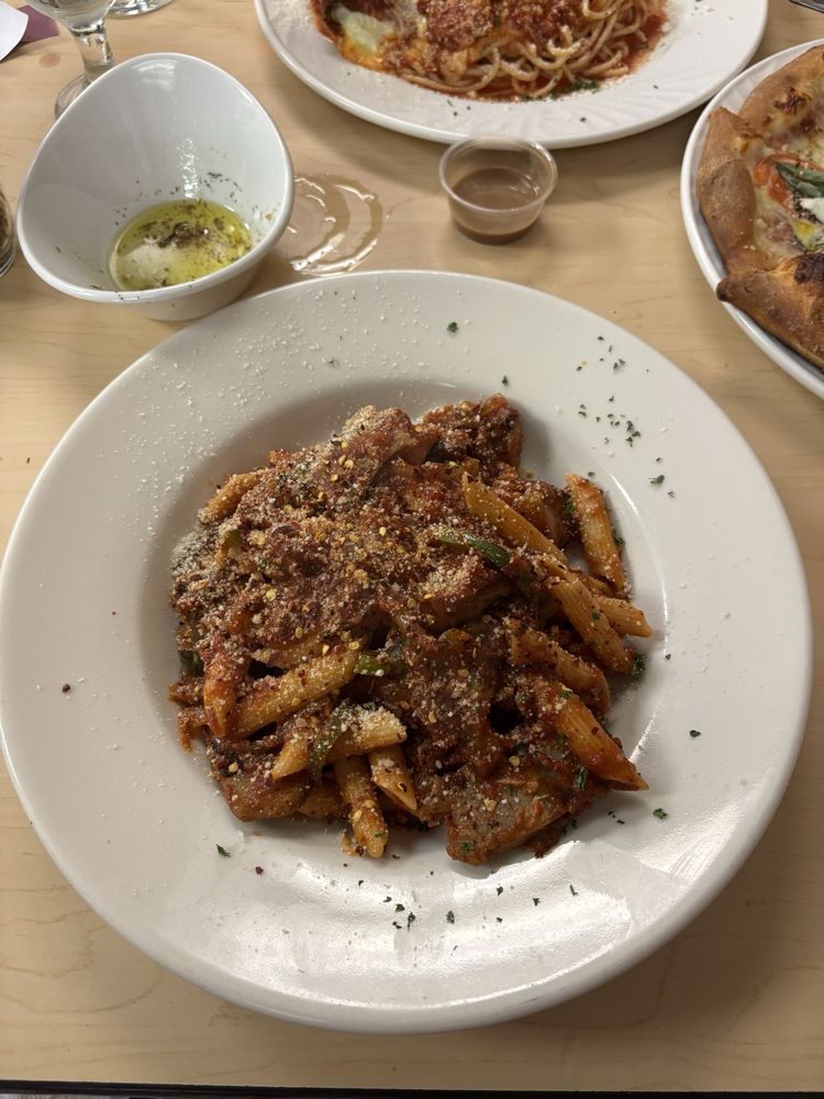 Tuscan Italian Restaurant & Pizzeria Logo