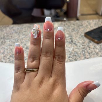 Crystal's Nails and Spa - gel frenchies with a flower charm - Nail Salons Near Me - Hesperia, California