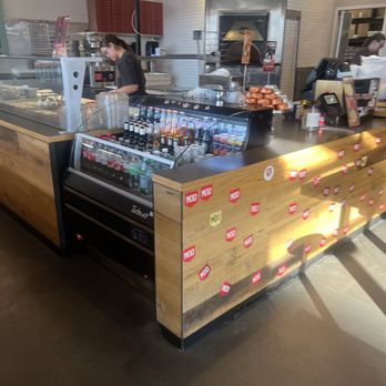 MOD Pizza - Offer a counter fridge with sodas, sparking waters, wine and beer in can or glass form. - Pizza Near Me - Gilbert, Arizona