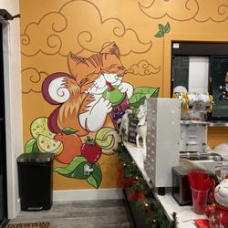 Moe’s Tea - Cute boba cat wall art by the front counter!