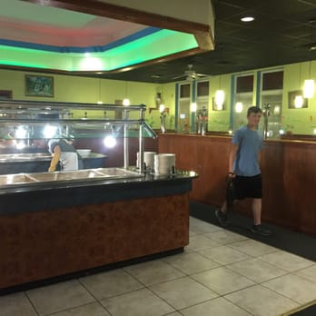 China One - a man standing in front of a buffet - Chinese Near Me - Boonville, Missouri China One - a man standing in front of a buffet - Chinese Near Me - Boonville, Missouri
