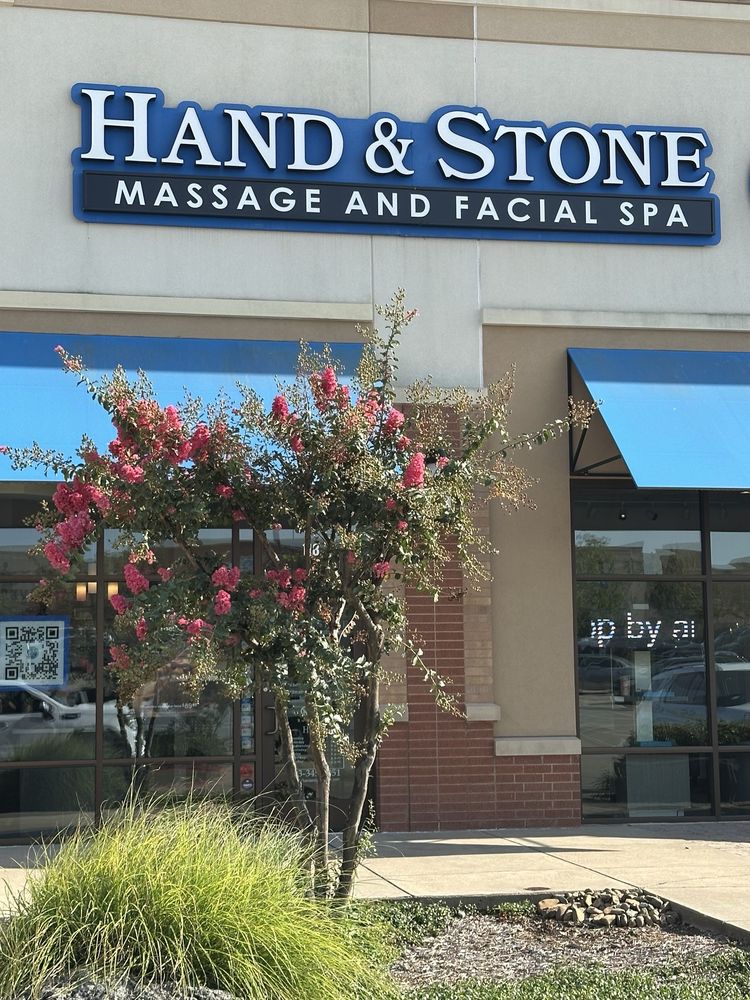 Hand & Stone Massage and Facial Spa Logo