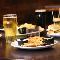 Mahogany Bar - Grab a beer and some good eats.