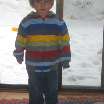 Fritsch Construction - a young boy standing in front of a sliding glass door - General Contractors Near Me - Tahoe City, California Fritsch Construction - a young boy standing in front of a sliding glass door - General Contractors Near Me - Tahoe City, California