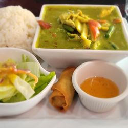 House of Thai & Ramen - Green Curry with chicken, bamboo, green bean and bell peppers.