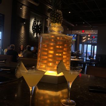 Firebirds Wood Fired Grill - Pineapple jar that has been soaking in liquor for 90 days. - Steakhouses Near Me - Lees Summit, Missouri