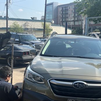Tech Auto Maintenance - Two guys working on two different issues (and a third man working on something in the office for me). - Auto Repair Near Me - Houston, Texas