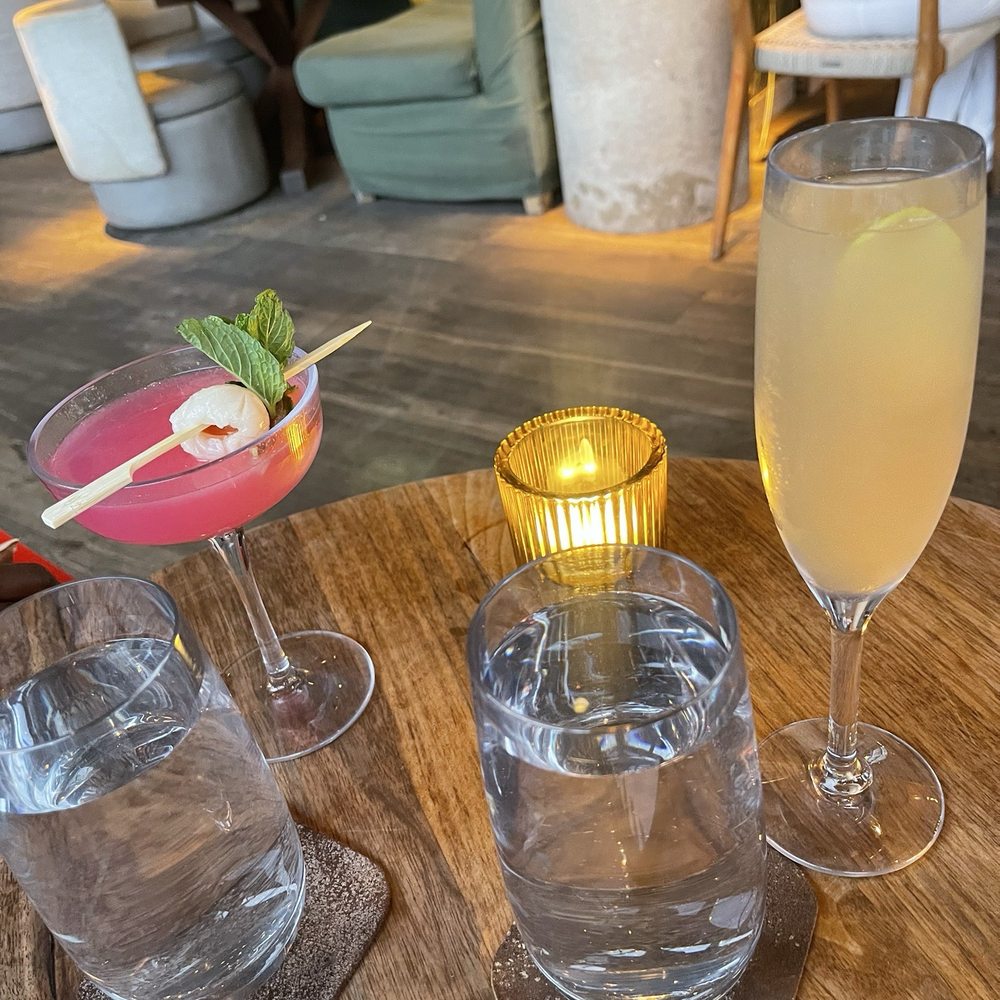 Harriet's Rooftop - mocktail French 75 (right) and mocktail: Yuzu No Yume (way too tart; on left) - Cocktail Bars Near Me - Toronto, Ontario Harriet's Rooftop - mocktail French 75 (right) and mocktail: Yuzu No Yume (way too tart; on left) - Cocktail Bars Near Me - Toronto, Ontario