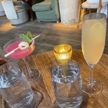 Harriet's Rooftop - mocktail French 75 (right) and mocktail: Yuzu No Yume (way too tart; on left) - Cocktail Bars Near Me - Toronto, Ontario Harriet's Rooftop - mocktail French 75 (right) and mocktail: Yuzu No Yume (way too tart; on left) - Cocktail Bars Near Me - Toronto, Ontario