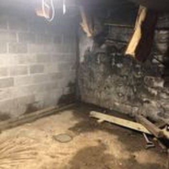 SmartCrawl - basement foundation wall (on the left) was rebuilt - Waterproofing Near Me - Franklin, Indiana