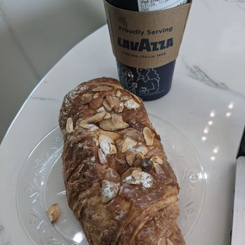 Qargo Coffee - Dirty vanilla chai and almond croissant - Coffee & Tea Near Me - Fountain Valley, California Qargo Coffee - Dirty vanilla chai and almond croissant - Coffee & Tea Near Me - Fountain Valley, California