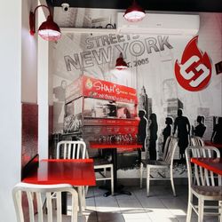 Shah's Halal Food - The sunlight streams into their spacious windows, making for a lovely afternoon scene.